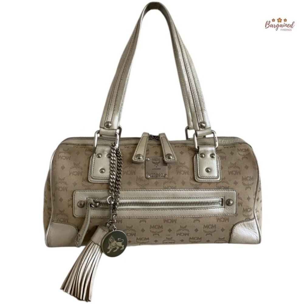 Authentic MCM Beige Canvas Monogram Metallic Leather Boston Bag w/ Tassel